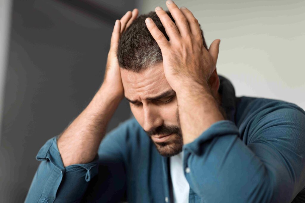 frustrated man looking for solutions